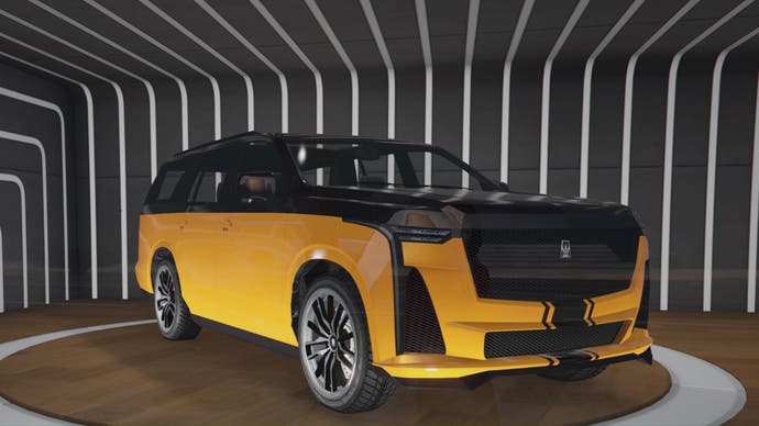 A black and yellow albany cavalcade xl 4x4 car is in the window of the luxury autos showroom